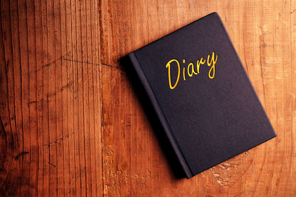 Diary notebook on a desk may give clues as to why a child ran away from home.